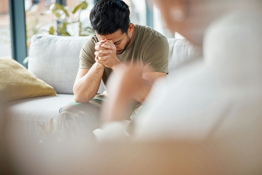 man receiving brainspotting therapy in california clinic