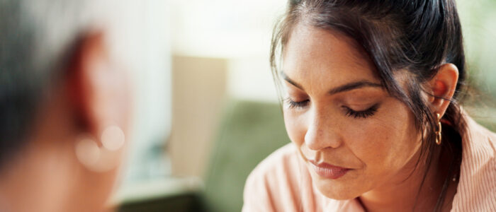 Psychologist, therapy and woman with depression, consultation and help. Counseling session, therapist and sad patient with trauma, ptsd and conversation for mental health advice in psychology office Psychologist, therapy and woman with depression, consultation and help. Counseling session, therapist and sad patient with trauma, ptsd and conversation for mental health advice in psychology office